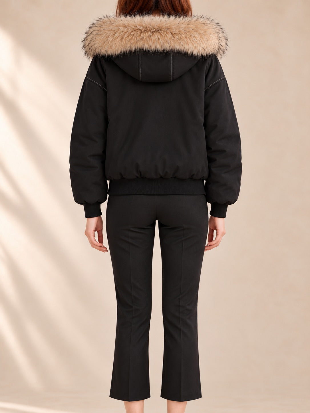 Hooded Puffer Jacket in Black, back view