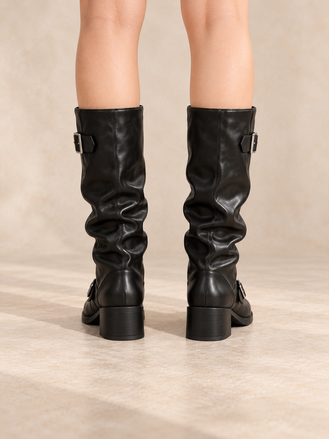 Buckled Mid-Calf Slouch Boots in Black, back view