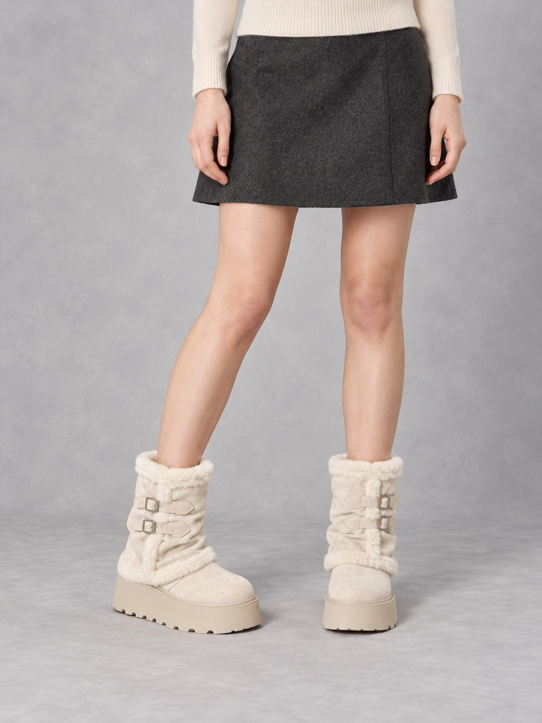 Fold-Over Platform Snow Boots in White, styled on model